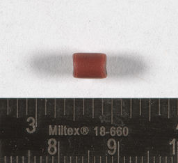 Red drawn glass bead with black core