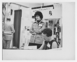Two people at National Gay Task Force display at the 1973 APA Convention
