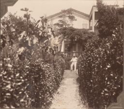 Ford Madox Ford in front of Villa Paul