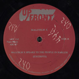 Malcolm X speaks to the people in Harlem
