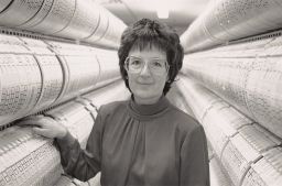 Christine A. Shoemaker in Front of Disk Drives