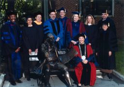 University's Senior Administration: pose with President Judith Rodin and "Ben on the Bench" before 2003 Commencement