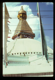 chorten ra Boudha Nathko mandir (छोर्तेन र बौद्ध नाथको मन्दिर / Prayer Flags and Boudha Nath Temple)