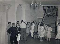 Crowd of students around staircase