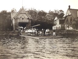Crew (men's), 1904 team, launching a shell