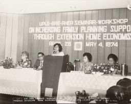 Woman Speaking at a Podium UPLB- BAE AHEA Seminar