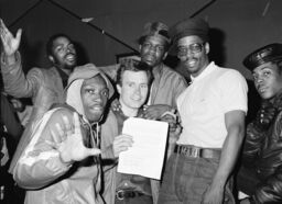 Cold Crush Brothers and Charlie Ahearn signing the contract for Wild Style, Dixie Club