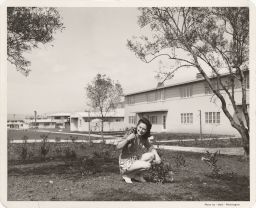 Woman in a garden in Baldwin Hills Village.