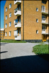 Four-story, brick residential building (Vanhainkoti, Helsinki, FI)