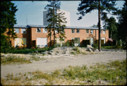 Attached, brick, two-story residences in a wooded area (Bandhagen, Stockholm, SE)