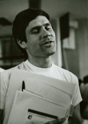 Portrait of man holding paperwork