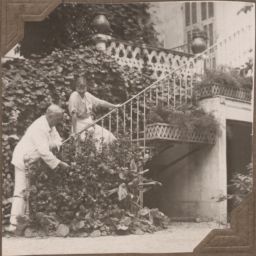Ford Madox Ford and Julia Ford on stairs