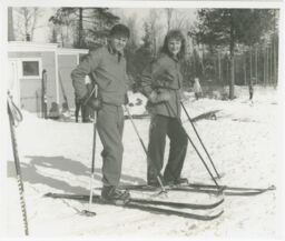 William Read skiing with his sister