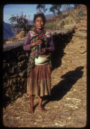 Pong bokeki mahila (पोङ बोकेकी महिला / A Woman Carrying a Wine Bottle)