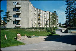 Four-story residential building and nearby playground area (Kaplya, Helsinki, FI)