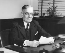 Paul Howard Musser (1892-1951), A.B. 1916, Ph.D. 1928, at his desk
