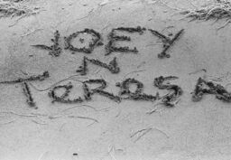Writing on the beach, Salinas, Puerto Rico