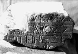 Fragment a of STATUE BASE FOR A PRIEST OF TIBERIUS AND EXEGETE OF THE EUMOLPIDAI. (IG II² 3524)