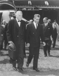 Shah of Iran, Mohammad Reza Pahlavi (1919-1980), LL.D. (hon.) 1962, walking from helicopter with Penn President Gaylord Harnwell