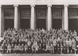 Hotel School Students and faculty group portrait in front of Bailey Hall