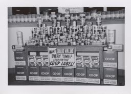 Want solid vaue every time? Look for the Co-op label! sign and food display.