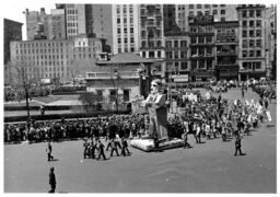 The "Daily Worker" float makes its way through New York streets in the 1937 May Day parade.