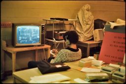 Student viewing chalk-board lecture on TV, called videotape viewer