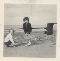 Photograph of Lindsay Cooper as a child on a beach