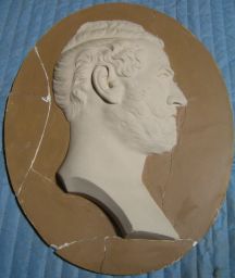 Portrait bust (of unidentified figure) in profile relief