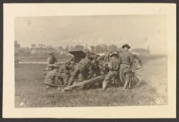 Student military training in field with cannon or large caliber gun, possibly a 4.7 inch gun