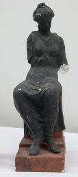 Statuette of a seated young woman