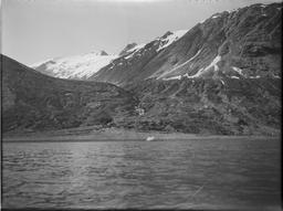 Hanging valley nearest Gannett Nunatak, on south side of fiord, from water