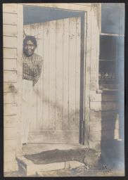 Woman standing in doorway