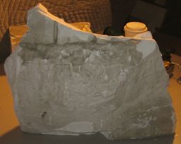 Fragment of rocky base with rim garment