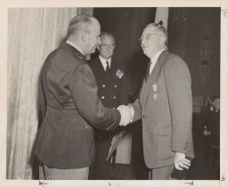 Ramdall J. LeBoeuf Jr. Receiving the Award of Merit For His Wartime Service as President of the NTAA (National Travelers Aid Association) and as a Founder and a Director of the USO.