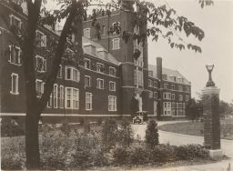 Front of Prudence Risley Hall, with car parked near entrance.