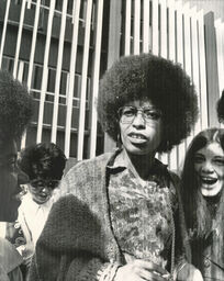 Angela Davis, center, is stopped outside the Santa Clara County Superior Court as she arrived for her second day of trial. Two of her followers show their reaction as she is told she cannot enter the area because of an attempted jail escape in progress, San Jose, California, March 28, 1972