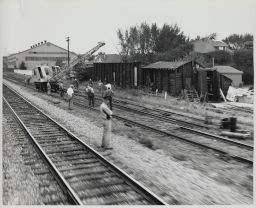 Main line and Maywood lead being worked on with a Burro Crane