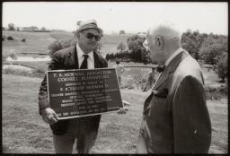 Newman presented with plaque