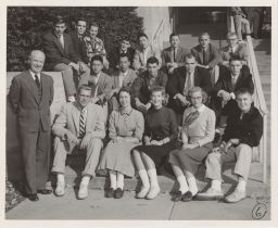 Hotel School: Dean H.B. Meek and hotel students at Statler Hall steps