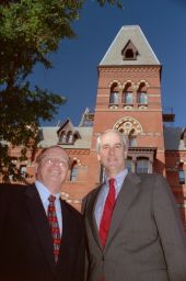 Pres. Rawlings and Dean Swieringa standing in front of Sage (different view)