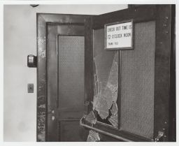 Broken glass in door in Willard Straight Hall.