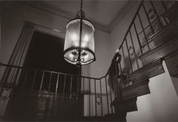 Stairway, with chandelier in foreground