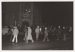 Protesters outside Willard Straight Hall at night.