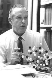 Jerry Donohue (1920-1985), with a molecular model