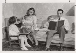 Dr. Urie Bronfenbrenner (and wife?) reading to children.