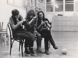 Photograph of Lindsay Cooper, Maggie Nicols, and Joelle Leandre knitting