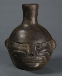 Blackware human head effigy bottle