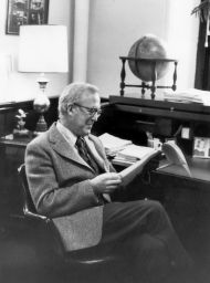 Eliot Stellar (1919-1993), working at his desk in the Provost's office