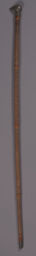 Carved wooden cane with metal head